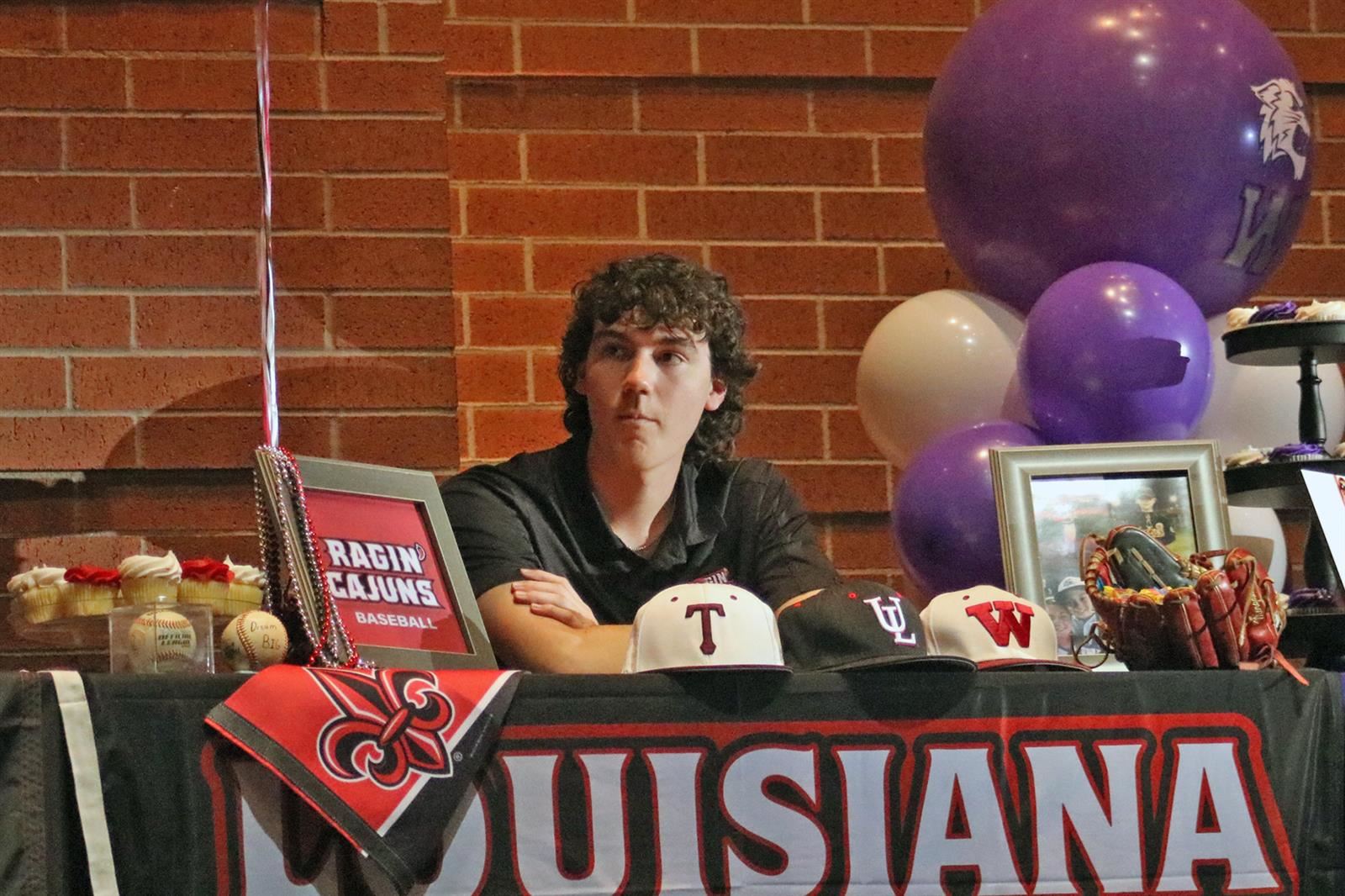 Cypress Woods High School senior Chase Morgan signed a letter of intent to play baseball at the University of Louisiana.